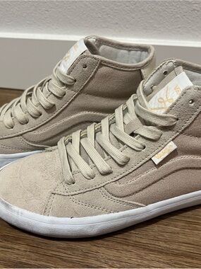 Vans Women’s Mid-Top Sneakers in Light Beige